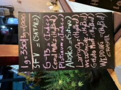 Harweed Moon, Chiang Rai, Thailand menu board listing cannabis strains like SFV, G-13, Alaska, and more, with pricing.