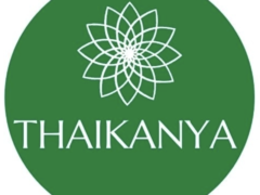 Thaikanya Medical logo, green circle with a white floral design, Hua Hin, Thailand, cannabis products.