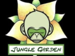 Jungle Garden dispensary logo, Koh Chang, Thailand, featuring a monkey face within a flower.