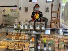 Inside Khao Yai Cannabis dispensary near Khao Yai National Park, cannabis flower and smoking accessories.