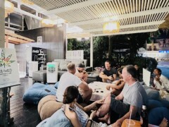 SeaWeed Cannabis Store in Hua Hin, Thailand, cafe-style setting with customers relaxing, enjoying the space and atmosphere.