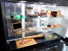 THC Bangkok cannabis accessories display in Khlong Toei, Bangkok. Featuring RAW rolling papers, grinders, and smoking accessories.