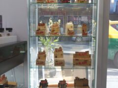 Rolling papers and accessories display at THC Bangkok cannabis shop in Khlong Toei, Bangkok.