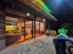 KoMui Gardens cannabis shop in Fisherman's Village, Bophut, Koh Samui. Weed products visible inside.