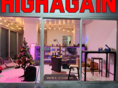 Exterior of High Again cannabis shop in Nawamin/Ram Inthra, Bangkok, Thailand, with Christmas decorations visible.