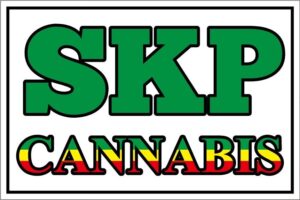 SKP Cannabis logo with green text over red, yellow, and green text; surrounded by a black border.