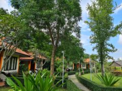 Exterior of The Oriental Village Chiangmai in Mae On District, a cannabis-friendly resort in Thailand with gardens.