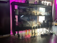 KING CANNABIS Pattaya: Bongs and glass smoking accessories displayed in a cannabis shop in Thailand.