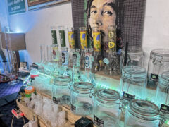 KING CANNABIS Pattaya display of glass bongs, jars labeled 