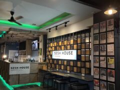 Interior of Sesh House cannabis shop in Krabi, Thailand. Marijuana dispensary with modern design and seating.