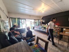 Onelove420store interior, Ban Fang, Khon Kaen. Cannabis shop with seating, smoking accessories, and cannabis flower display.