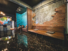 Interior of 420 Route Surin Beach, Phuket, Thailand. Stylish cannabis shop with modern design and seating. Weed in Phuket.