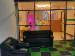 Amnesia Weed Shop in Chiang Rai. Exterior view with seating area and 