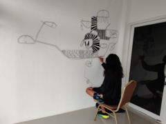Artist creating mural inside Best Weed Bangkok | MAE SOT cannabis shop, Mae Sot, Tak, Thailand.