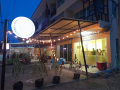 Exterior of Cannabis @ Phuket cafe and delivery by HHT in Sakhu, Thalang District, Phuket, showing signage and string lights.