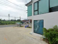 Exterior view of Cannabis @Hive Cannabistro in Thalang District, Phuket, Thailand, featuring modern building facade and street view.