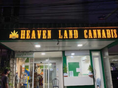 Exterior of HEAVEN LAND CANNABIS in Pattaya, Chon Buri, illuminated sign, cannabis shop, flower and smoking accessories.