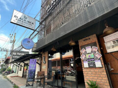 Exterior of HEMPTON Dispensary @ BlackJack Bar in Ko Samui, Thailand, selling cannabis flowers and smoking accessories.