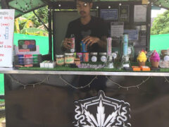 Makan Cannabis weed shop, Pak Nam, Krabi. Cannabis flower, smoking accessories, and bongs are displayed.