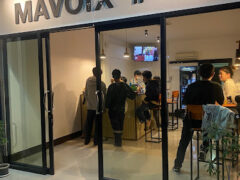 Mavoix#13 weed shop exterior, ดู่ใต้ Nai Wiang, Nan, Thailand. Cannabis dispensary with customers inside.