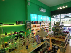 Interior of Meet Weed cannabis shop in Pattaya, Thailand, showing smoking accessories and cannabis products.