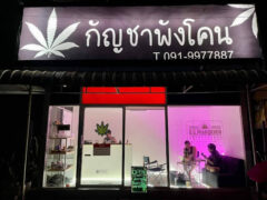 O.G.Phangkhon cannabis dispensary in Phang Khon, Sakon Nakhon. Cannabis shop with flowers and smoking accessories. Open sign visible.