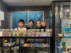 OG Cozy dispensary, showing staff and cannabis products, Sathon, Bangkok, Thailand.
