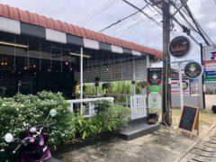 Exterior of Pachamama Cannabis Store in Chalong, Phuket. String lights, storefront with signage, selling flowers and smoking accessories.