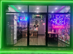 Exterior of Sawadee Ganja cannabis shop in Sai Mai, Bangkok with neon 