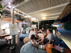 SeaWeed Cannabis Store Huahin 83 in Hua Hin: exterior with people relaxing, sign, and beanbag seating. Weed shop atmosphere.