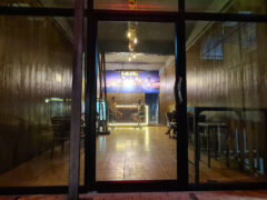 Siam Amsterdam cannabis dispensary in Bang Lamung, Chon Buri, Thailand. Interior view of bar with customers.