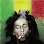 Bob Marley portrait with dreadlocks and a cigarette, against a Rasta colored background.