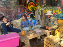 ร้านสหายกัญ cannabis cafe in Sakon Nakhon, Thailand. Customers enjoying weed and smoking accessories.