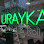 URAYKA neon sign lit in green.
