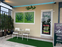 Weeds Cafe exterior, cannabis shop in Pattaya City, Thailand. Signage, tables and chairs visible. Flowers and smoking accessories offered.