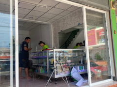 WiP CannaBian cannabis shop in Samut Sakhon, Thailand. Interior view of weed dispensary showing display cases.