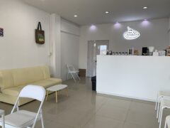 Blessed Ayutthaya cannabis & coffee shop interior in Phra Nakhon Si Ayutthaya, Thailand. Modern design, seating area.