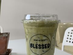 Iced matcha latte at Blessed Ayutthaya cannabis cafe in Phra Nakhon Si Ayutthaya, Thailand.