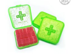 THC edible gummies in green containers, product of High Island Thailand.