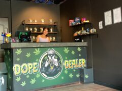 Dope Dealer cannabis shop interior, Koh Chang, Thailand. Cashier and weed for sale visible.