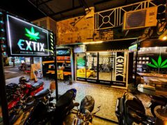 EXTIX Cannabis dispensary exterior, Kata Beach, Phuket, Thailand. Weed shop with cannabis leaf logo.