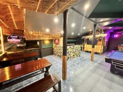 Interior of The Goodlife Bar, Koh Samui, Thailand, showing bar, pool table, and seating area.