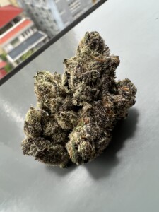 Close-up of a cannabis flower bud with trichomes.
