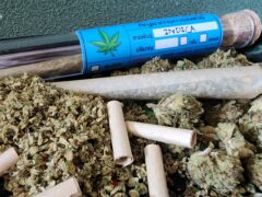 Cannabis flower, pre-rolls, and Indica label, Phi Phi Island, Thailand.