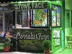 Stone Face Koh Chang cannabis shop exterior, Kai Bae, Thailand. Graffiti art, 