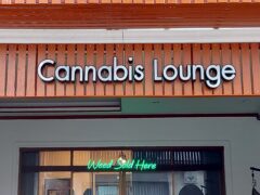 Cannabis Lounge exterior with neon 