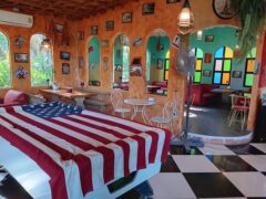Interior of Chief Weed Dispensary in Mae Rim, Chiang Mai with pool table and decorative interior.