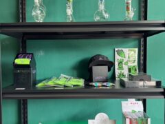 Channel Weed Store DMK (Donmueng) shop display with smoking accessories, bongs, and lighters.