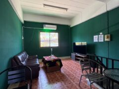 Interior lounge of Channel Weed Store DMK (Donmueng) near the airport, with seating, TV, and cannabis-friendly ambiance.