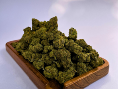 Cannabis buds on a tray at OH Dispensary, a weed shop in Khao San, Bangkok, Thailand.